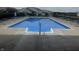 Community pool with a 3ft depth and lounge chairs near the fence at 14309 Shooting Star Dr, Noblesville, IN 46060
