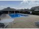 Enjoy the community pool with plenty of lounge chairs on a sunny day at 14309 Shooting Star Dr, Noblesville, IN 46060