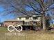 A spacious deck on the rear of this brick home provides an inviting spot for relaxation at 15237 Citation Rd, Carmel, IN 46032