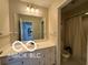 Bathroom features white vanity with a large mirror, and a shower/tub combination with a shower curtain at 15237 Citation Rd, Carmel, IN 46032