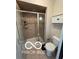 Updated bathroom featuring a glass-enclosed shower, modern fixtures, and tiled floors for a spa-like experience at 15237 Citation Rd, Carmel, IN 46032