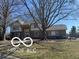 Charming two-story home features a well-maintained lawn and mature trees at 15237 Citation Rd, Carmel, IN 46032