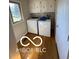 Functional laundry room equipped with a washer, dryer, and ample storage cabinets for convenience at 15237 Citation Rd, Carmel, IN 46032