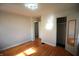 Spacious bedroom features hardwood floors, closet, and neutral walls at 1739 Forest Dr, Indianapolis, IN 46227