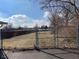 The backyard features chain link fencing that surrounds the property, offering security and clear boundary lines at 1913 Albany St, Beech Grove, IN 46107