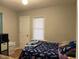 Neutral bedroom featuring a bed, and bright window at 1913 Albany St, Beech Grove, IN 46107