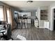 Bright and airy kitchen with white cabinets, sleek countertops, and modern bar seating at 1913 Albany St, Beech Grove, IN 46107