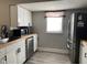 Functional kitchen with modern appliances, butcher block counters and ample storage at 1913 Albany St, Beech Grove, IN 46107