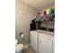 Convenient laundry room with washer, dryer, and storage space at 1913 Albany St, Beech Grove, IN 46107