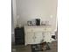 Living room featuring a buffet, coffee maker, and pet-friendly space at 1913 Albany St, Beech Grove, IN 46107