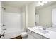 Clean bathroom featuring a shower-tub combo and vanity sink at 19499 Grassy Branch Rd, Westfield, IN 46074