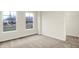 Cozy bedroom with neutral colored carpeting and two bright windows for lots of light at 19499 Grassy Branch Rd, Westfield, IN 46074