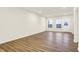 Bright living room with hardwood flooring and lots of natural light coming through the windows at 19499 Grassy Branch Rd, Westfield, IN 46074
