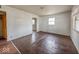 Bedroom with hardwood flooring, neutral walls, and natural light streaming in through the windows at 2370 N Moreland Ave, Indianapolis, IN 46222