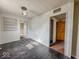 Bedroom features natural light streaming in from the window with black colored wood flooring at 2370 N Moreland Ave, Indianapolis, IN 46222