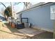 Back of house with deck, patio, and an air conditioning unit at 2908 N Colorado Ave, Indianapolis, IN 46218