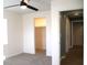 Bedroom featuring a closet, neutral paint, a ceiling fan, and gray carpet at 2908 N Colorado Ave, Indianapolis, IN 46218