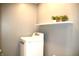 Functional laundry room featuring a washer and a shelf accentuating the space at 2908 N Colorado Ave, Indianapolis, IN 46218