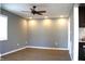 Bright living room with a ceiling fan and recessed lighting showcasing the beautiful floors at 2908 N Colorado Ave, Indianapolis, IN 46218