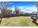 Fully fenced backyard with a fire pit, offering privacy and ample space for outdoor activities at 3079 Limber Pine Dr, Whiteland, IN 46184