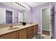 Spacious bathroom with a double sink vanity and neutral colored countertop at 3079 Limber Pine Dr, Whiteland, IN 46184