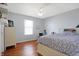 Cozy bedroom with hardwood floors, large window and nice decor at 3079 Limber Pine Dr, Whiteland, IN 46184
