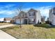 Side view of a two-story home featuring vinyl siding, maroon shutters, and green grass at 3079 Limber Pine Dr, Whiteland, IN 46184