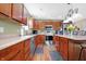 Well-equipped kitchen features stainless steel appliances, ample counter space, and hardwood floors at 3079 Limber Pine Dr, Whiteland, IN 46184