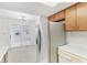Dining area adjacent to the kitchen with sliding door access to patio at 3125 Anniston Dr, Indianapolis, IN 46227