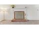 Close-up of the brick fireplace with decorative screen in the living room at 3125 Anniston Dr, Indianapolis, IN 46227