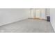 Bright living room featuring neutral carpet, fresh white walls, and great natural lighting at 3125 Anniston Dr, Indianapolis, IN 46227