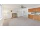 Open-concept living room with fireplace and easy access to kitchen and patio at 3125 Anniston Dr, Indianapolis, IN 46227