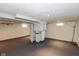 Unfinished basement with painted floor and exposed duct work at 317 Albany St, Indianapolis, IN 46225