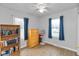 Comfortable bedroom featuring neutral paint, hardwood floors, and lots of storage space at 317 Albany St, Indianapolis, IN 46225