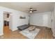 Bright living room featuring neutral paint, hardwood floors, with lots of space to entertain at 317 Albany St, Indianapolis, IN 46225
