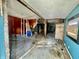 An interior showcases demolition with debris and exposed framework, offering renovation potential with a lot of light at 327 N Bradley Ave, Indianapolis, IN 46201