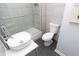 Modern bathroom featuring a vessel sink, tiled shower, and sleek fixtures at 3406 E 20Th St, Indianapolis, IN 46218