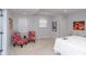 Inviting bedroom with neutral walls, a cozy rug, and patterned accent chairs for relaxation at 3406 E 20Th St, Indianapolis, IN 46218