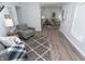 Comfortable living room with seating, rug, and stylish decor at 3406 E 20Th St, Indianapolis, IN 46218