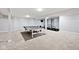 Large basement featuring a ping pong table and an exercise bike at 3532 Danbury Ct, Bargersville, IN 46106