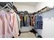Walk-in closet with wire shelving is filled with clothing, shoes, and hats at 3532 Danbury Ct, Bargersville, IN 46106