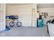 Garage featuring epoxy flooring and storage space at 3532 Danbury Ct, Bargersville, IN 46106