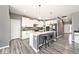 Beautiful kitchen features an island with bar stool seating and stainless steel appliances at 3532 Danbury Ct, Bargersville, IN 46106