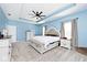 A spacious main bedroom featuring trey ceiling, neutral carpet, and custom paint at 3532 Danbury Ct, Bargersville, IN 46106