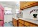 Bathroom with a window, vanity and wood finishings at 358 Webb Dr, Indianapolis, IN 46227