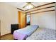 Simple bedroom featuring neutral decor, ceiling fan, and a connecting door at 358 Webb Dr, Indianapolis, IN 46227