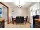 Cozy dining room with chandelier and floral wallpaper at 358 Webb Dr, Indianapolis, IN 46227