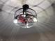 Modern caged ceiling fan with edison bulbs adds character and style to this home's ceilings at 360 S Spencer Ave, Indianapolis, IN 46219