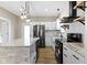 Modern kitchen with a stylish island, stainless steel appliances, and plenty of cabinet space at 360 S Spencer Ave, Indianapolis, IN 46219