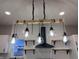 Unique farmhouse-style kitchen lighting adds character and style to the space at 360 S Spencer Ave, Indianapolis, IN 46219